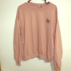 pink long sleeved sweatshirt